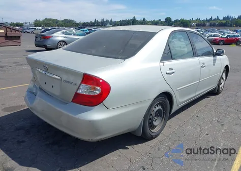 2003 Toyota Camry Le z USA, uszkodzony, nr VIN 4T1BE32K13U257218